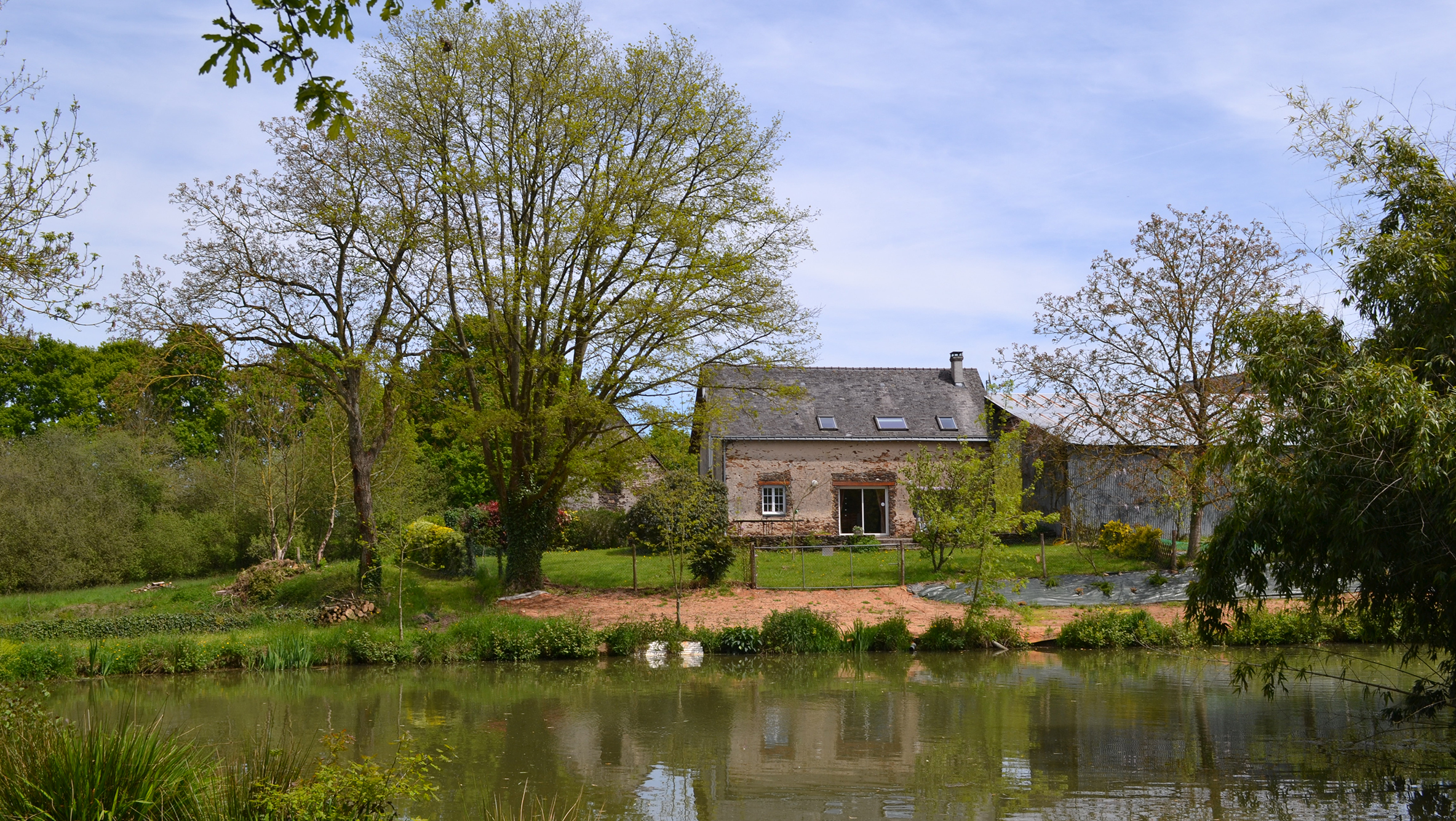 Cottage viewed from the private pond